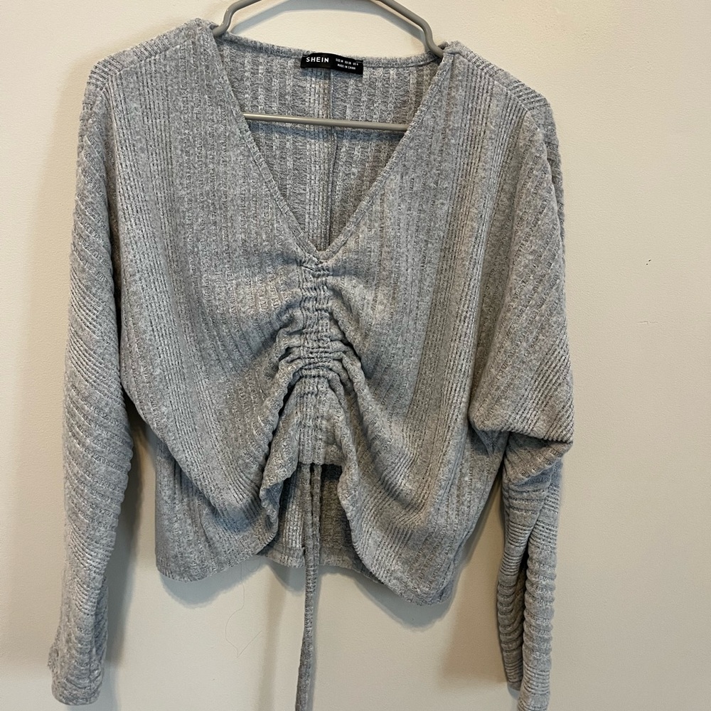 Grey sweater with front tie